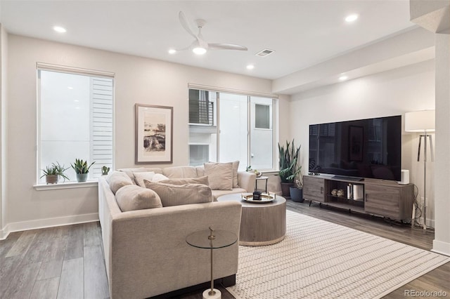 1284 Quitman St, Denver, CO 80204 - living room with wood finished floors, a ceiling fan, and recessed lighting
