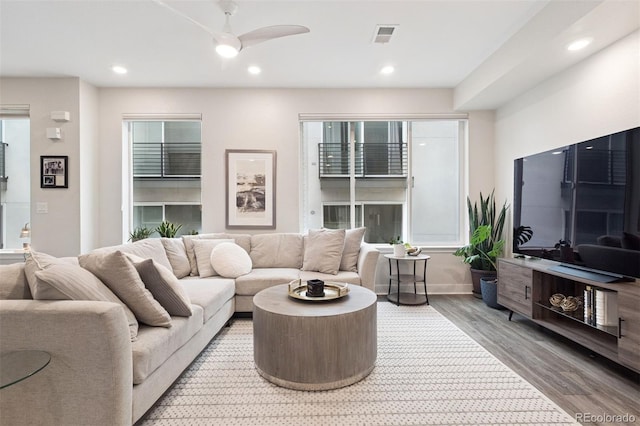 1284 Quitman St, Denver, CO 80204 - living room with wood finished floors, recessed lighting, and ceiling fan