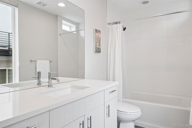 1284 Quitman St, Denver, CO 80204 - bathroom featuring vanity, shower / bath combination with curtain, and recessed lighting
