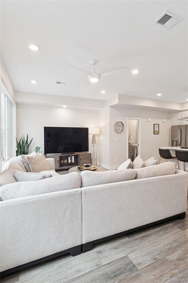 1284 Quitman St, Denver, CO 80204 - living room with wood finished floors, recessed lighting, and ceiling fan