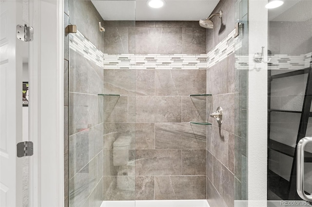 full bath featuring a stall shower