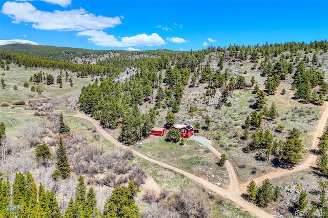 548 Coughlin Meadows Rd, Boulder, CO 80302 - aerial view of sparsely populated area with a heavily wooded area