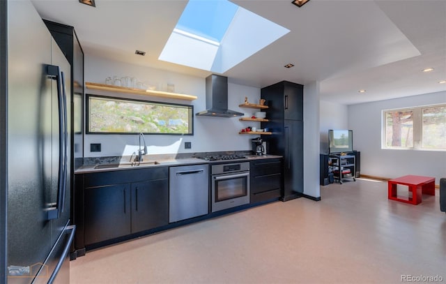 548 Coughlin Meadows Rd, Boulder, CO 80302 - kitchen featuring stainless steel appliances, wall chimney range hood, open shelves, a skylight, and dark cabinets