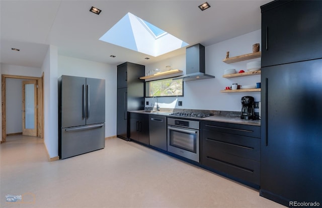 548 Coughlin Meadows Rd, Boulder, CO 80302 - kitchen featuring freestanding refrigerator, stainless steel oven, a skylight, wall chimney range hood, and open shelves