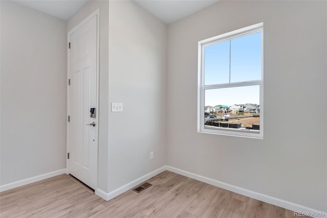 13502 E 100th Ave, Commerce City, CO 80022 - spare room with light wood-style floors and baseboards