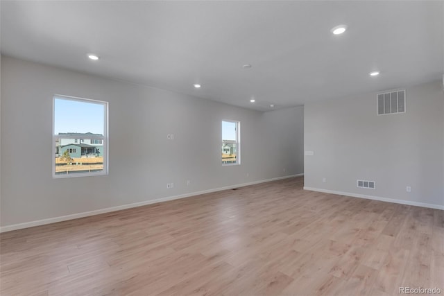 13502 E 100th Ave, Commerce City, CO 80022 - unfurnished room with recessed lighting, light wood finished floors, and baseboards
