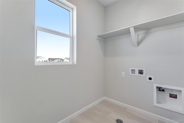 13502 E 100th Ave, Commerce City, CO 80022 - laundry room with electric dryer hookup, hookup for a washing machine, and baseboards