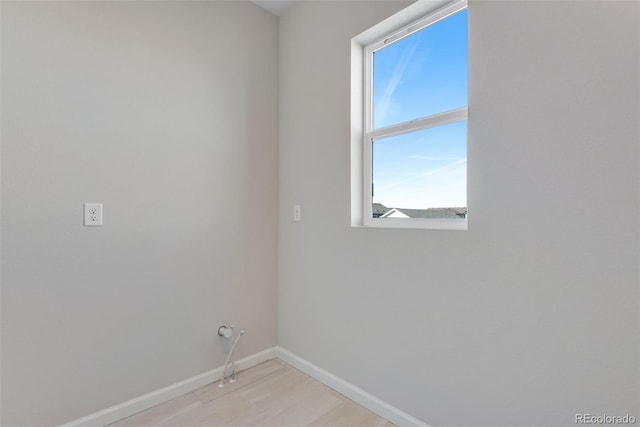 13502 E 100th Ave, Commerce City, CO 80022 - spare room featuring baseboards and light wood finished floors