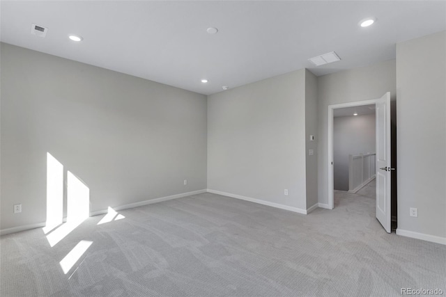 13502 E 100th Ave, Commerce City, CO 80022 - spare room with light carpet, recessed lighting, and baseboards