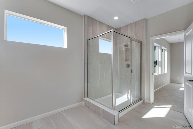 bathroom featuring walk in shower