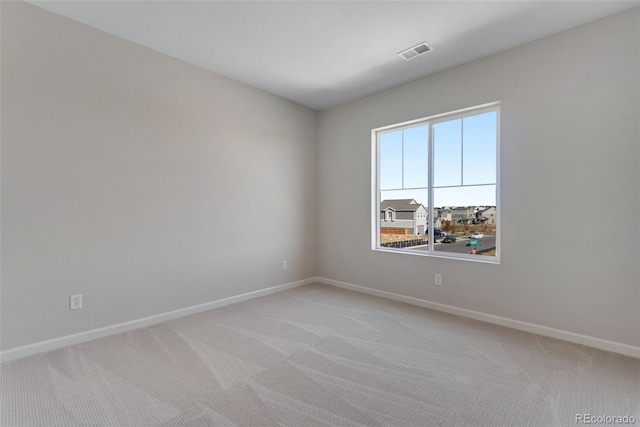 13502 E 100th Ave, Commerce City, CO 80022 - unfurnished room featuring light colored carpet and baseboards