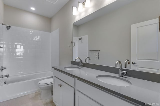 13502 E 100th Ave, Commerce City, CO 80022 - full bath featuring toilet,  shower combination, and double vanity