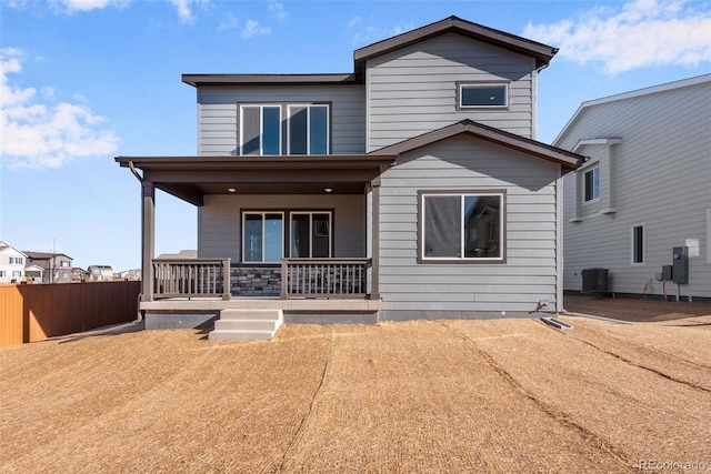 view of front facade with central AC unit and covered porch