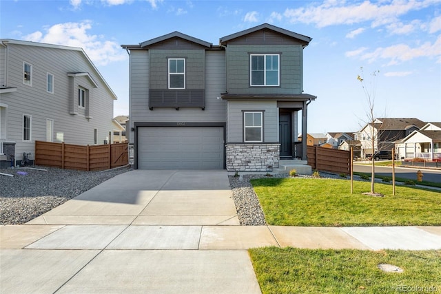 13502 E 100th Ave, Commerce City, CO 80022 - view of front facade featuring an attached garage, stone siding, driveway, and a residential view