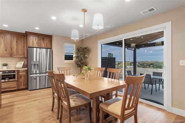 dining area featuring light hardwood / wood-style flooring