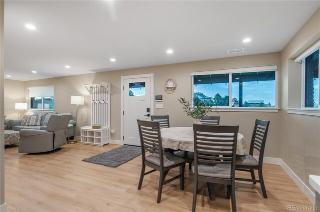 dining room with light hardwood / wood-style floors