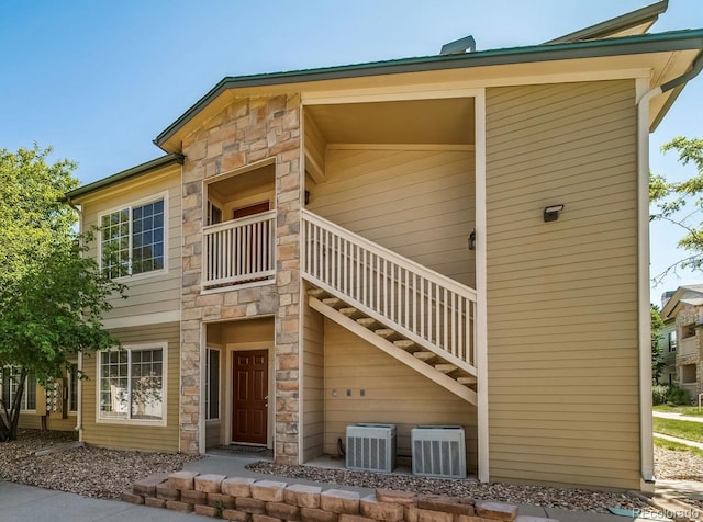 9911 E Idaho Cir Unit 202, Denver, CO 80247 - view of property featuring central AC