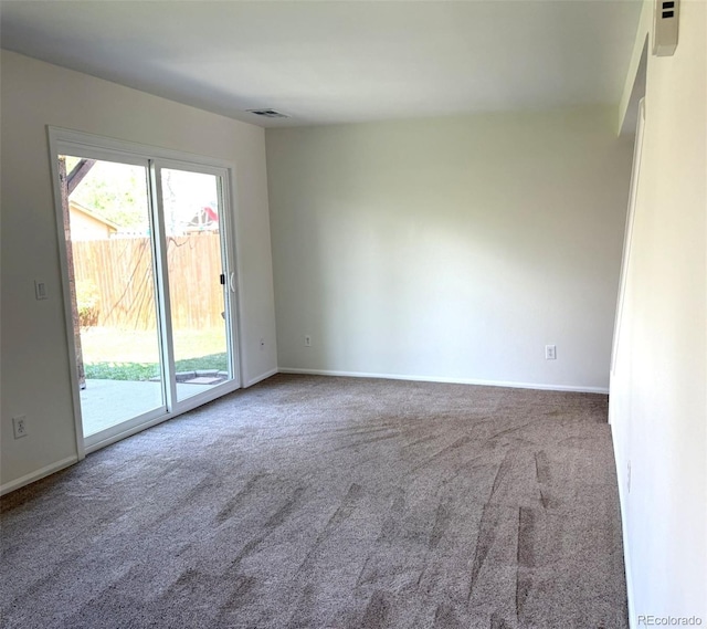12753 Elm St, Thornton, CO 80241 - carpeted empty room with baseboards