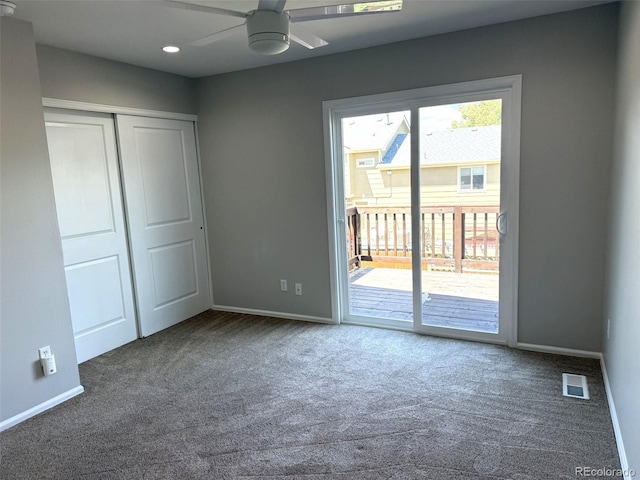 12753 Elm St, Thornton, CO 80241 - unfurnished bedroom featuring access to outside, carpet floors, a closet, and a ceiling fan