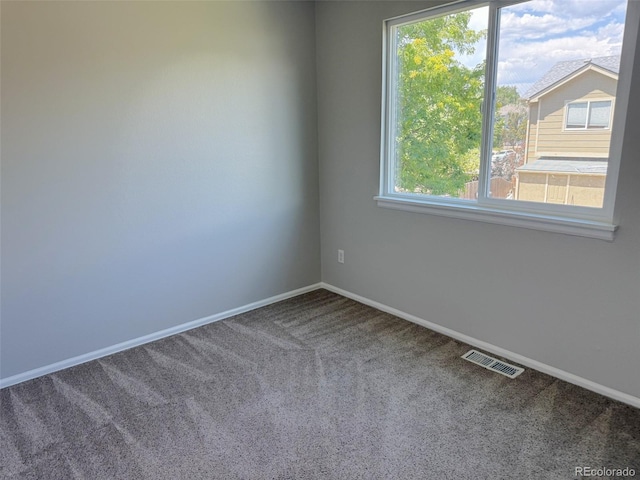12753 Elm St, Thornton, CO 80241 - spare room featuring carpet floors and plenty of natural light