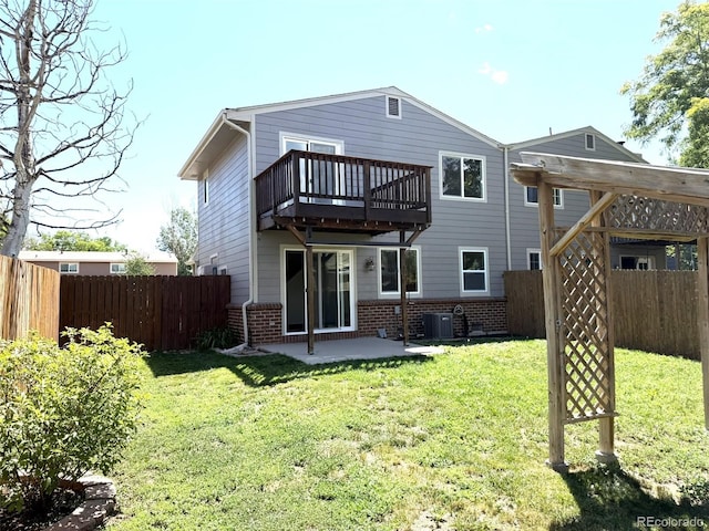 12753 Elm St, Thornton, CO 80241 - rear view of house featuring brick siding and a patio area