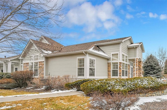 view of snow covered property