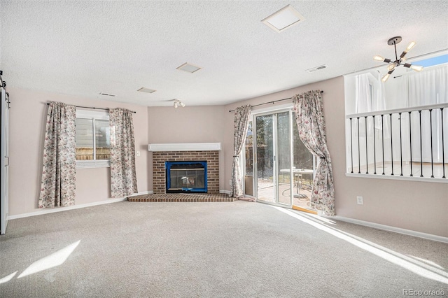 unfurnished living room with a fireplace, carpet flooring, visible vents, and baseboards