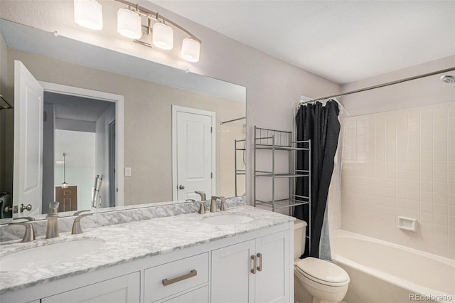 full bathroom featuring toilet, double vanity, a sink, and shower / tub combo with curtain