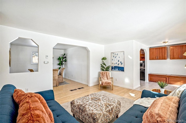 living room with light wood-type flooring