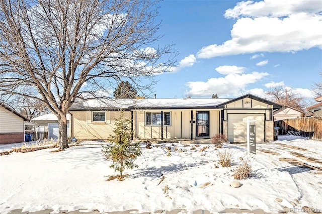 single story home featuring a garage