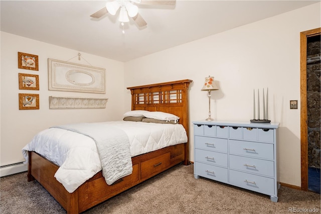 carpeted bedroom featuring baseboard heating and ceiling fan