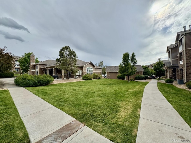 7440 S Blackhawk St Unit 208, Englewood, CO 80112 - view of home's community with a yard