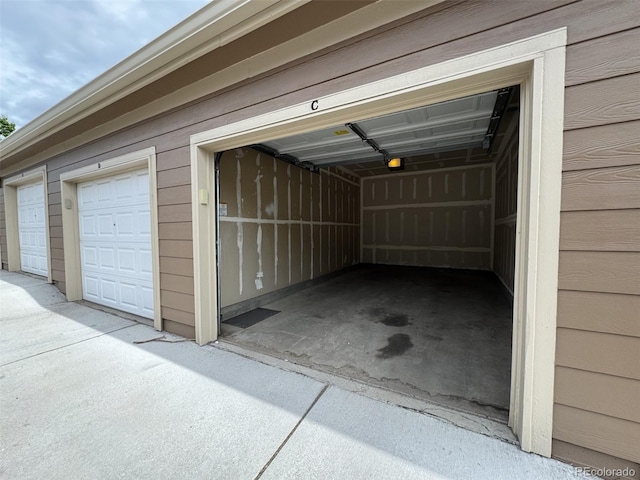 7440 S Blackhawk St Unit 208, Englewood, CO 80112 - garage with a garage door opener