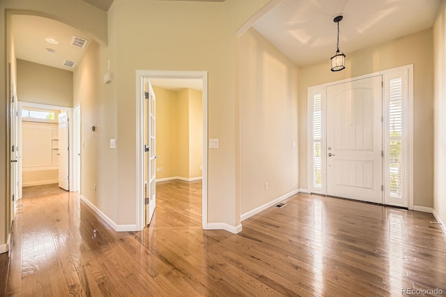 16550 Antero Cir, Broomfield, CO 80023 - foyer featuring arched walkways and wood-type flooring