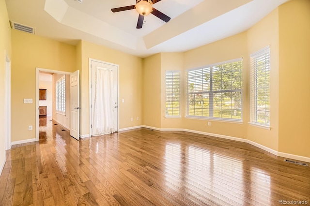 16550 Antero Cir, Broomfield, CO 80023 - unfurnished room featuring hardwood / wood-style flooring, a ceiling fan, and a raised ceiling