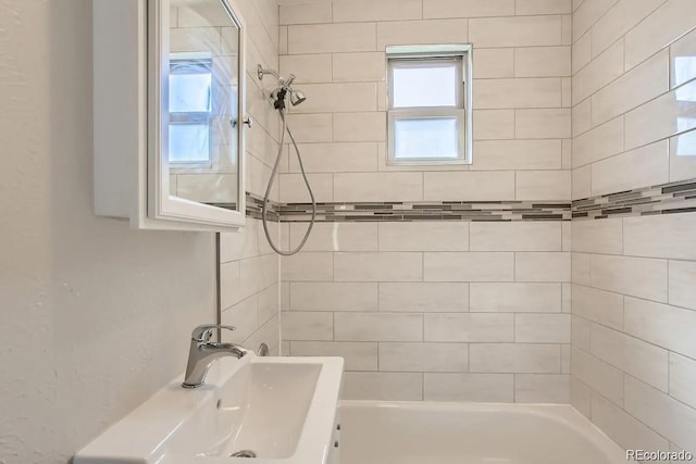 full bath with tub / shower combination and a sink