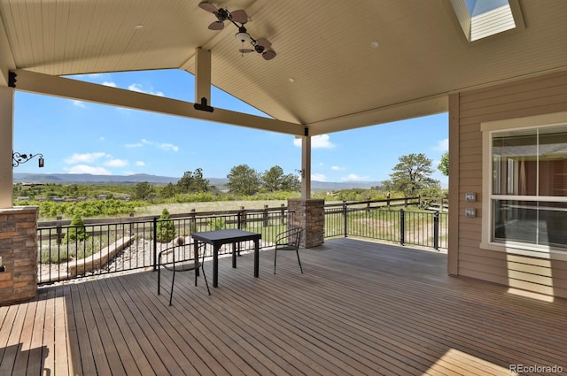 1975 Wild Star Way, Castle Rock, CO 80104 - deck featuring ceiling fan and a mountain view