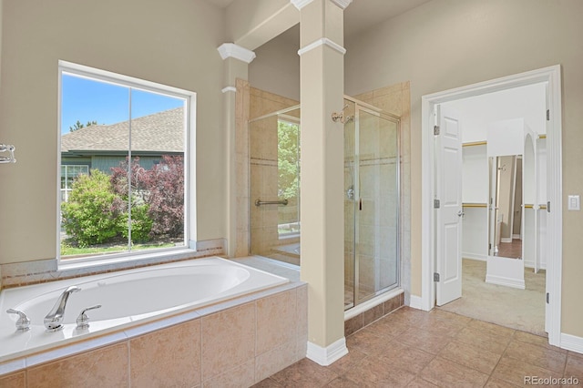 1975 Wild Star Way, Castle Rock, CO 80104 - full bath with a shower stall, plenty of natural light, and a bath