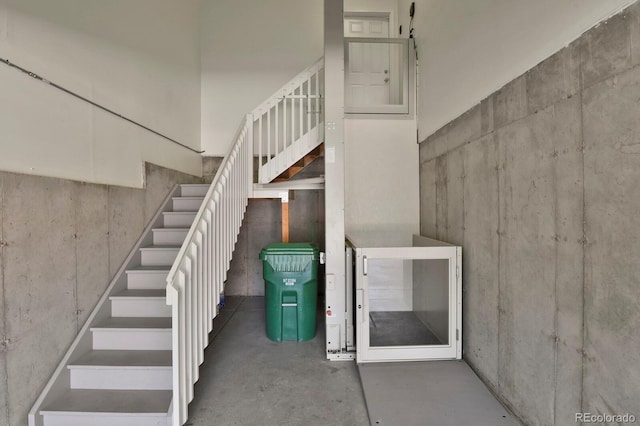 1975 Wild Star Way, Castle Rock, CO 80104 - stairway featuring concrete flooring