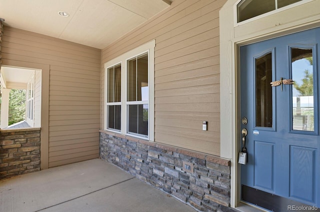 1975 Wild Star Way, Castle Rock, CO 80104 - view of exterior entry featuring stone siding