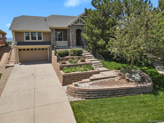 1975 Wild Star Way, Castle Rock, CO 80104 - tudor home with stairs, concrete driveway, an attached garage, and stone siding