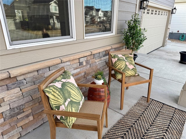 view of patio / terrace featuring driveway