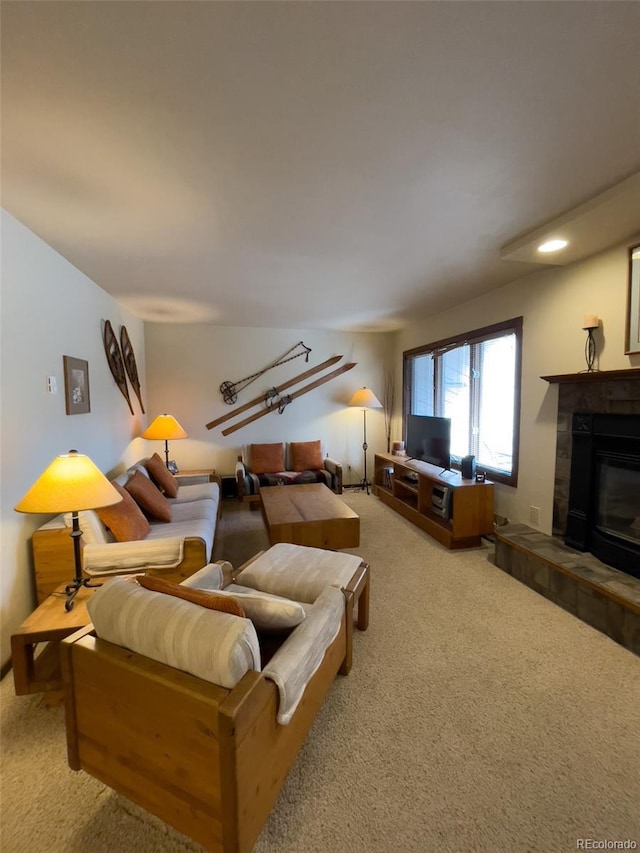 224 Creekside Dr Unit B, Frisco, CO 80443 - carpeted living area featuring a tile fireplace