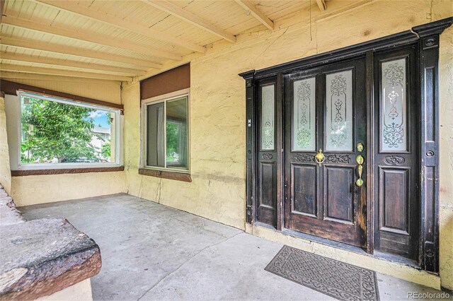 7 Elati St, Denver, CO 80223 - doorway to property with stucco siding