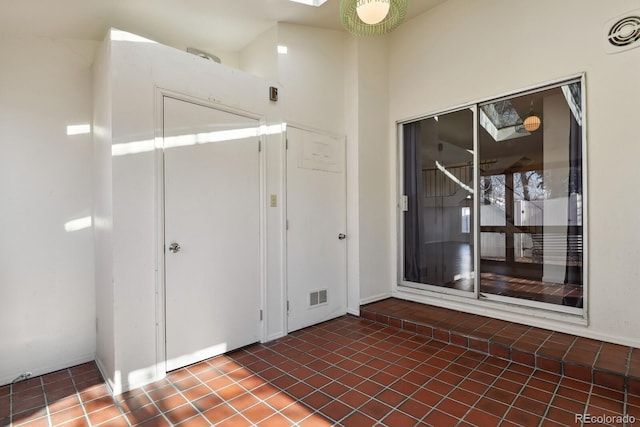 view of tiled foyer entrance