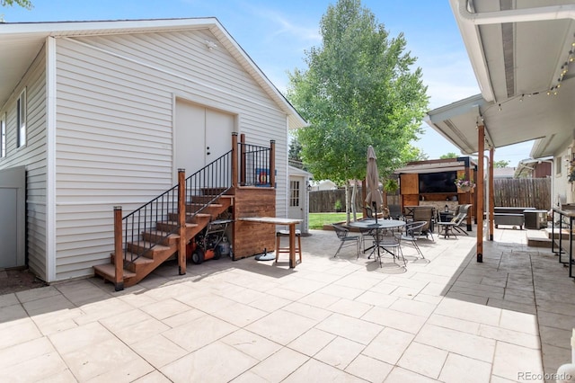 250 W Midway Blvd, Broomfield, CO 80020 - fenced backyard with outdoor dining space and a patio area