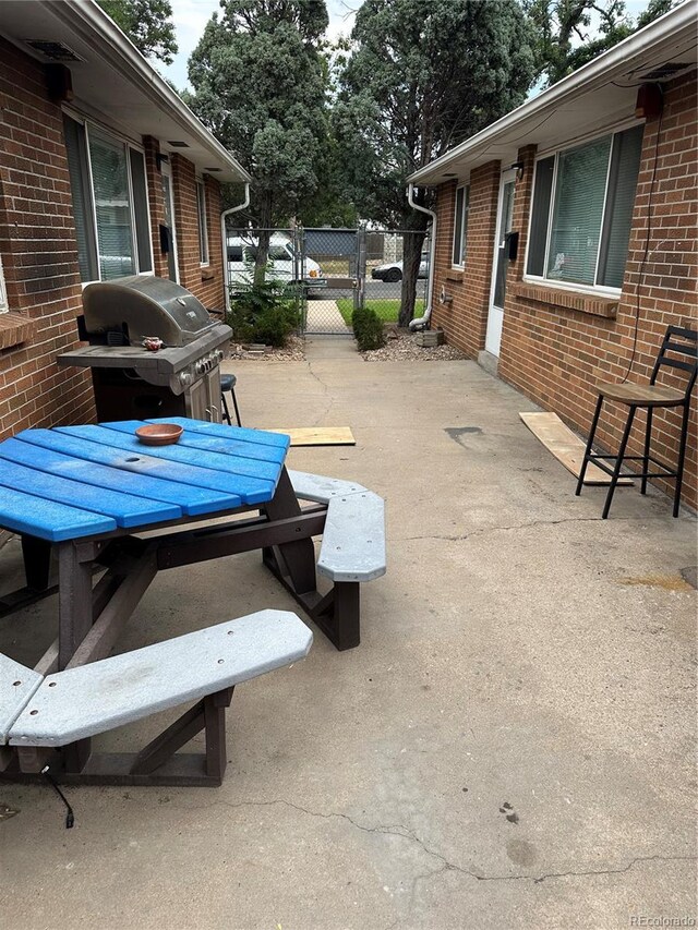 view of patio with a grill