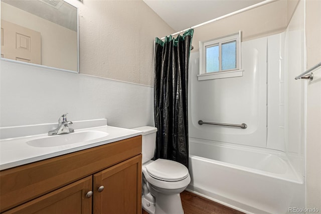 full bathroom with shower / bathtub combination with curtain, hardwood / wood-style floors, toilet, and vanity