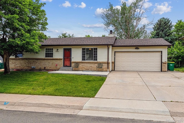 6508 S Garland Way, Littleton, CO 80123 - single story home featuring brick siding, a garage, a front lawn, and concrete driveway