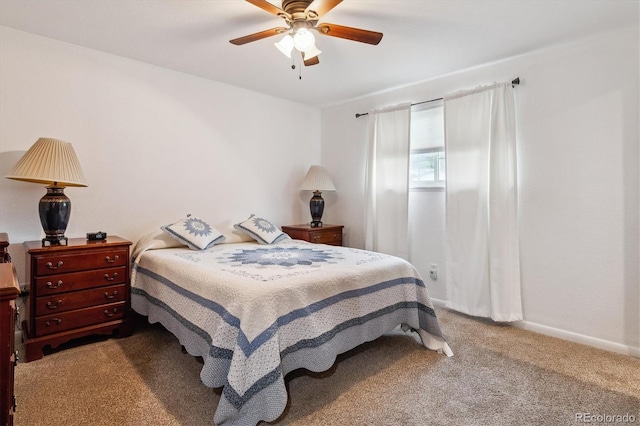 6508 S Garland Way, Littleton, CO 80123 - bedroom with carpet flooring and a ceiling fan